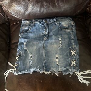 Lace Up Distressed Denim Skirt